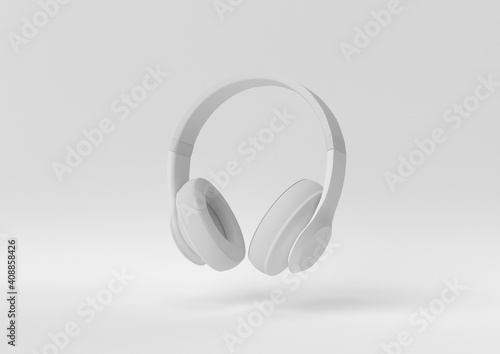 white headphone floating on white background. minimal concept idea. monochrome. 3d render.