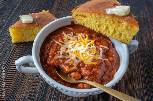 Canvas bowl of homemade chili with cornbread