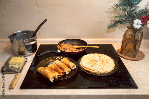 Cooking homemade Russian pancakes Bliny with meat on Shrovetide - Maslenitsa. Cooking at home