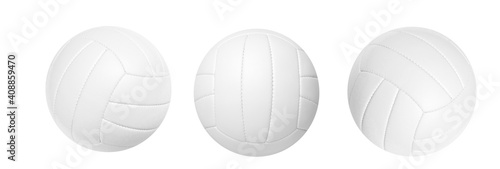 White volleyball leather ball set on white background. Sports equipment concept. photo