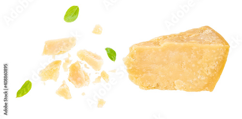 Obraz na płótnie Parmesan cheese with basil leaves isolated on white background