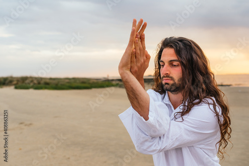 Concentrated Man Practicing Yoga Outdoors