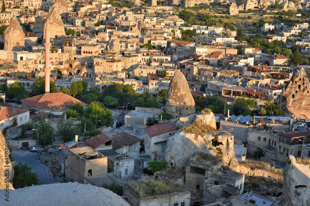 View of the old city of Goreme Cappadocia Turkey with cave hotels. Dawn over the famous city which balloons are launched. Goreme national park