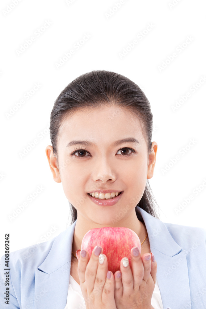 Oriental fashion woman holding red apple