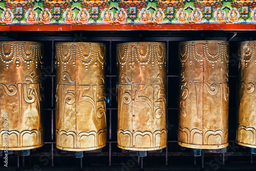 Papier peint Buddhist prayer drums in Dharamsala, Om Mani Padme Hum