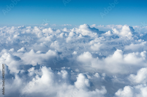 flight over the clouds. view of the clouds from the airplane window © Konstantin