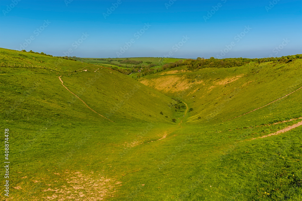 A view from the head of the longest dry valley in the UK on the South Downs near Brighton in springtime A view from the head of the longest dry valley in the UK on the South Downs near Brighton in springtime