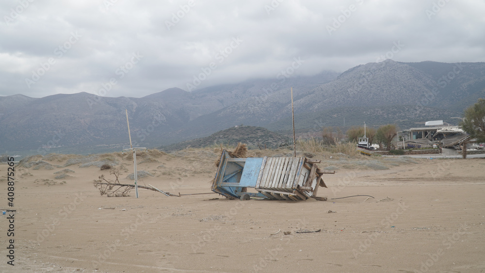 Fototapeta premium Malia Beach with washed up items after the big floodings on Crete Island in Greece.
