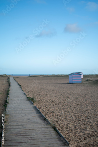 Beach huts on an empty Great Yarmouth beach in January 2021