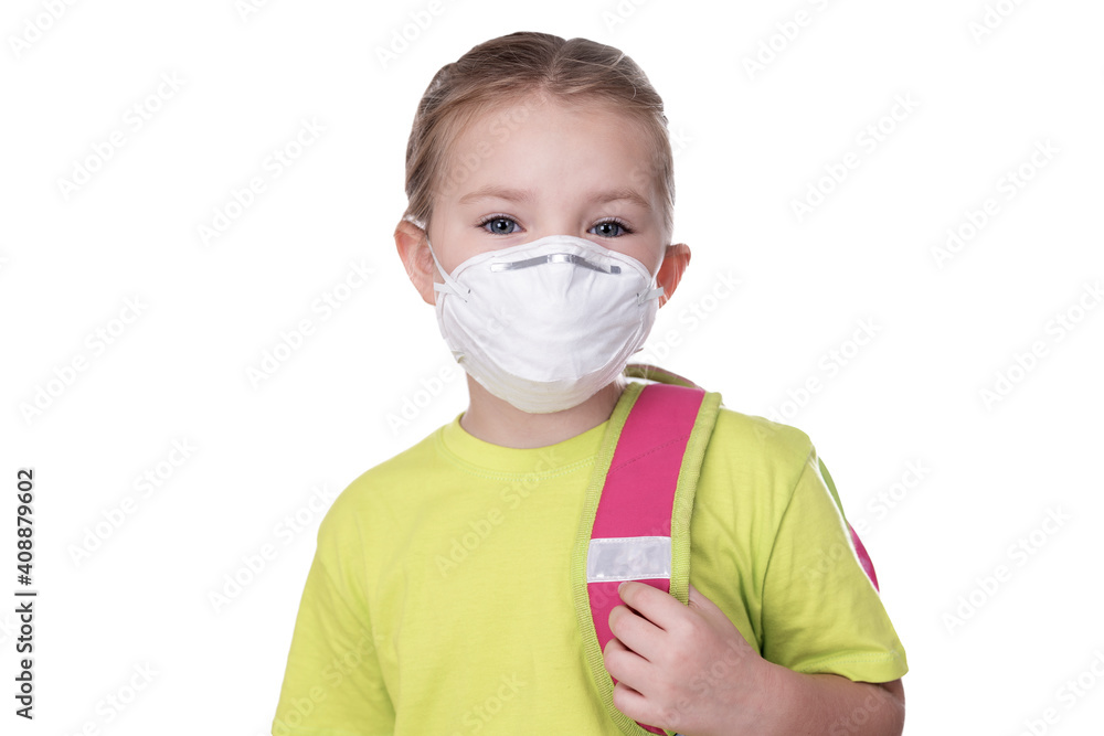Portrait little kid girl in wearing medical mask with backpack isolated on white background. Studio shot. High quality photo Portrait little kid girl in wearing medical mask with backpack isolated on white background. Studio shot. High quality photo