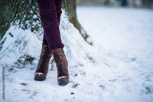 Closeup on woman outdoors in city park in winter