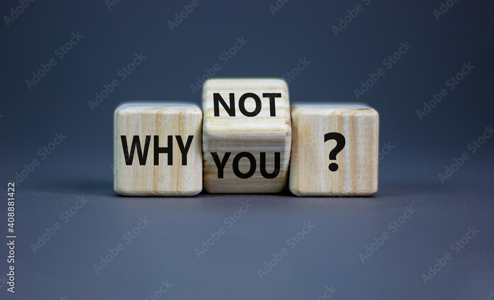 Why not you symbol. Turned a cube and changed words why you to why not. Beautiful grey background. Business and why not you concept. Copy space. Why not you symbol. Turned a cube and changed words why you to why not. Beautiful grey background. Business and why not you concept. Copy space.