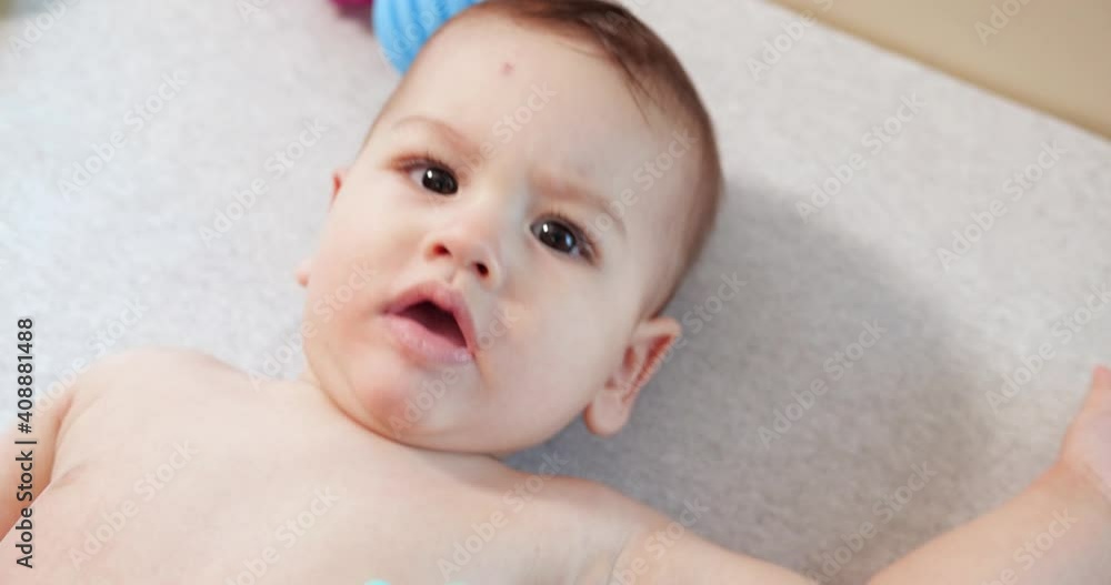 cute little baby boy infant newborn toddler portrait smiling to camera looking cute little baby boy infant newborn toddler portrait smiling to camera looking