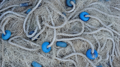 fishing net folded with buoys