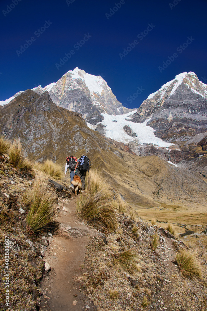 Trekkers along the Laguna Carhuacocha, Cordillera Huayhuash, Ancash, Peru
