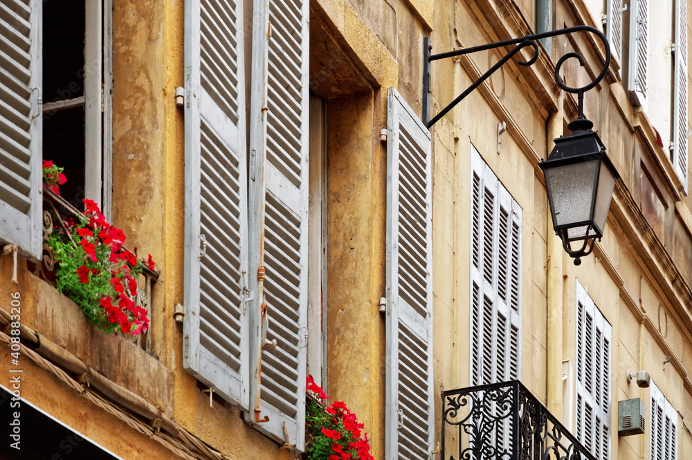 Part of facade of a yellow building in Aix-en-Provence, France