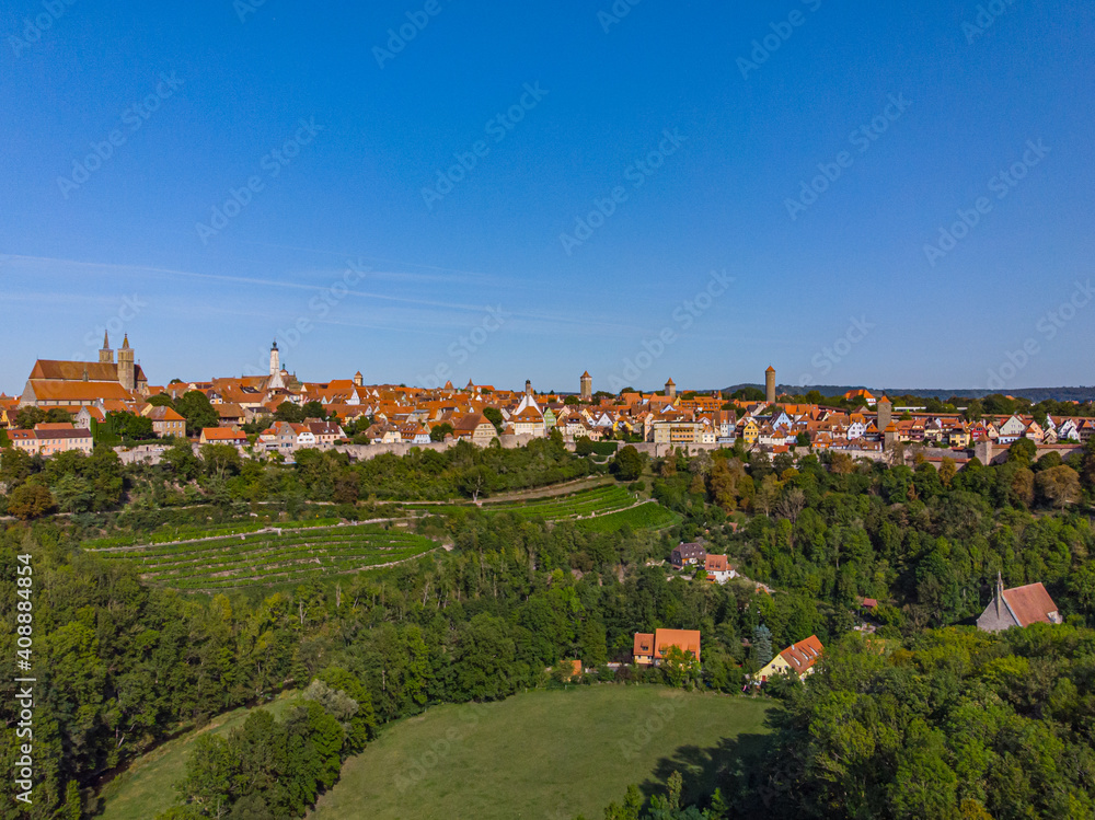 Above the roofs of Rothenburg ob der Tauber on a sunny summer day
