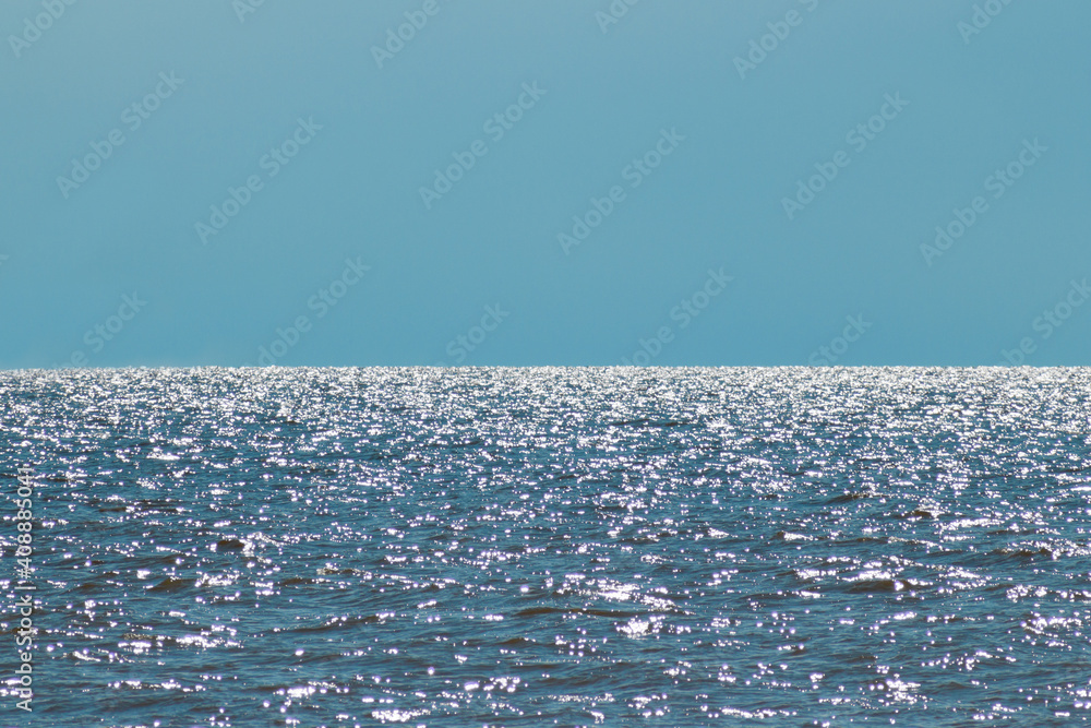 Beautiful sea and sky background. Blue clear sky and sparkle water of the sea. Travel and relax concept