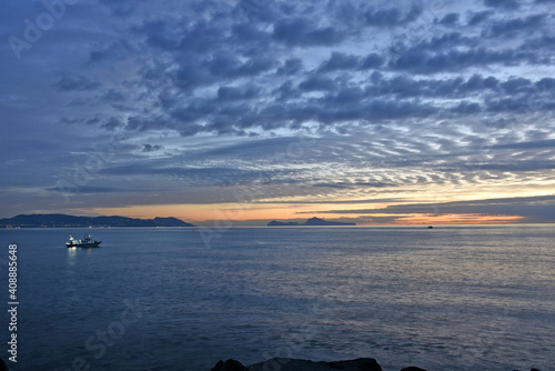 фотографія The island of Capri seen from Torre del Greco, a town in the province of Naples, Italy
