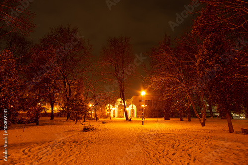 Benches in the snow at night in the park © onyx124