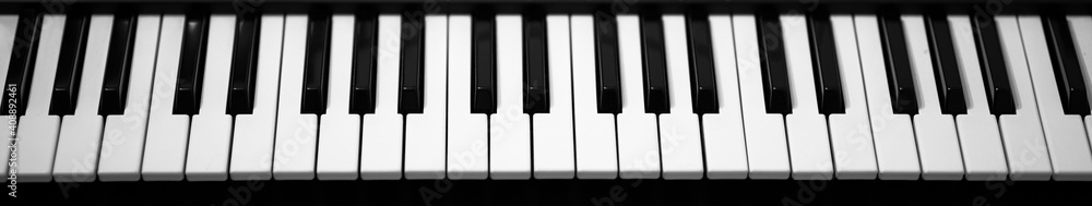 Electronic piano keyboard. Closeup of black and white piano keys Electronic piano keyboard. Closeup of black and white piano keys