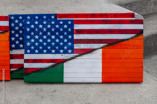 Coney Island, Brooklyn, New York, USA. USA and Ireland flag painted on the wood selling on The Great Irish Fair of New York charity event.