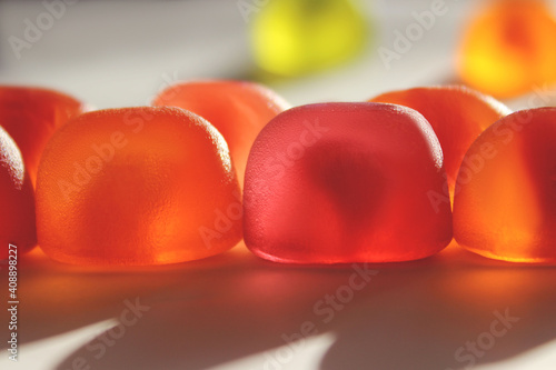 Blurred image of jelly candies. Abstract colorful food background