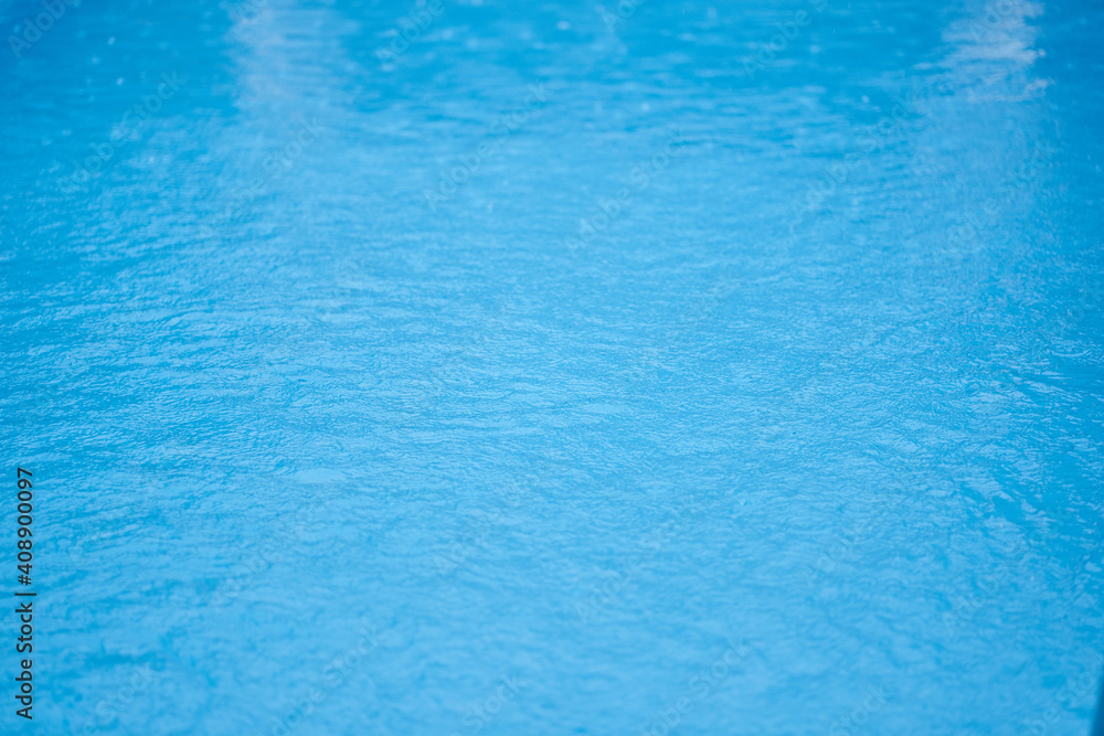 blue water surface in rain
