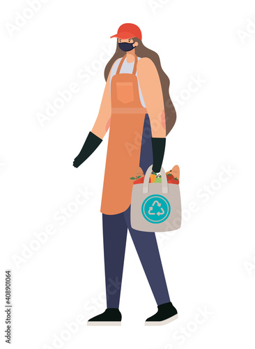 delivery woman with safety mask and one ecobag full of market products
