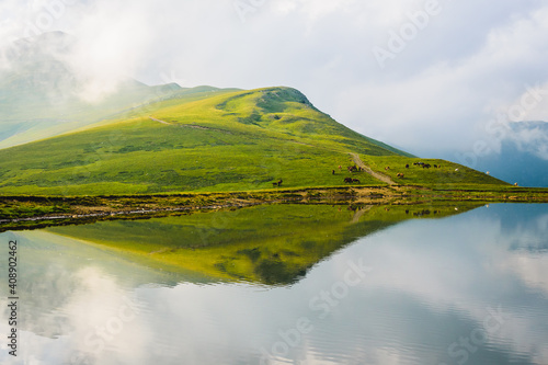 Landscape with lake and mountains photo