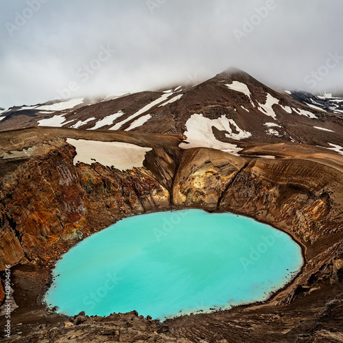 Mount Askja geothermal lake in a cloudy day, Iceland photo