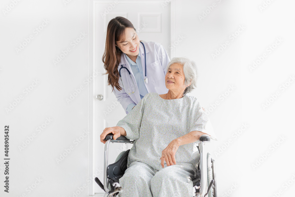 close up patient, Asian doctor drive wheelchair and touch on shoulder of patient, doctor and old female talk about symptoms and treatment plan, rehabilitation activity, elderly healthcare promotion close up patient, Asian doctor drive wheelchair and touch on shoulder of patient, doctor and old female talk about symptoms and treatment plan, rehabilitation activity, elderly healthcare promotion