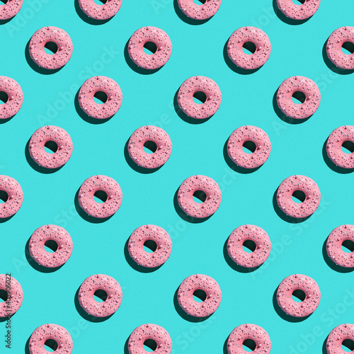 Sweet donuts pattern on a blue background.