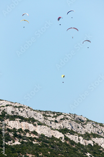 Paragliders over the mountains, Parque Natural da Arrábida, Setúbal, Portugal
