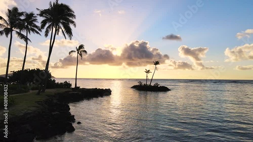 Flyby Point of Interest Palm Tree Island Silhouettes, The ultimate Hawaiian experience at Kāhala Beach, Honolulu in 2021 photo