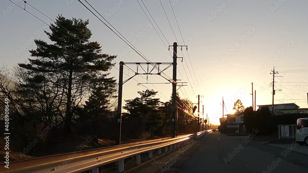 Road along the railroad tracks in the evening Road along the railroad tracks in the evening