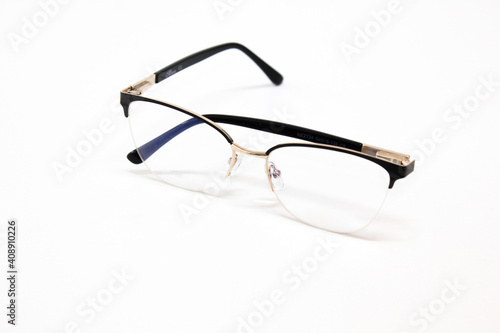 Optic glasses, black and golden frame