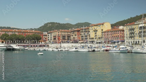 Wallpaper Mural View of the port in the city of Nice on the Mediterranean Sea: hills, houses, yachts, a sailing boat. Torontodigital.ca