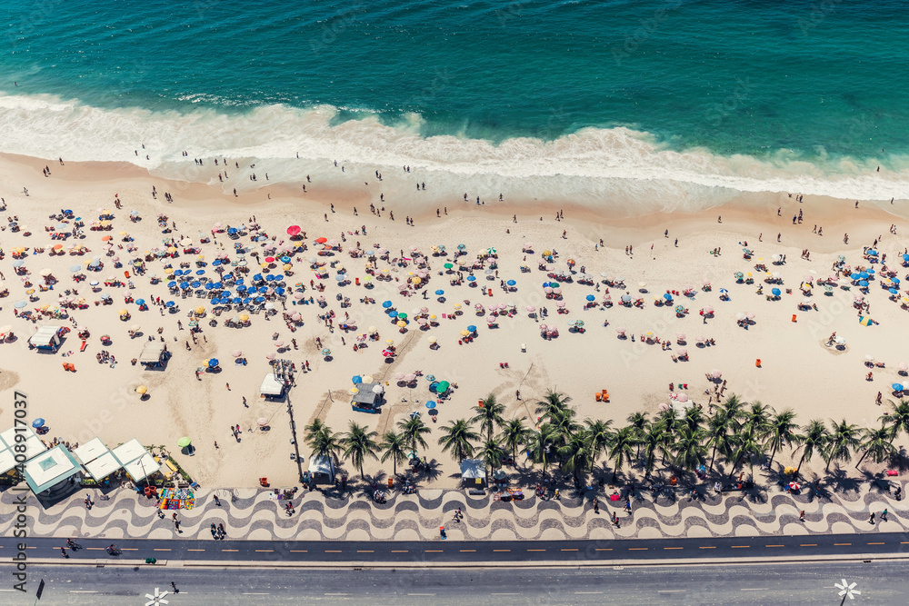 High angle view of Copacabana beach full of people relaxing on the sun, Rio de Janeiro