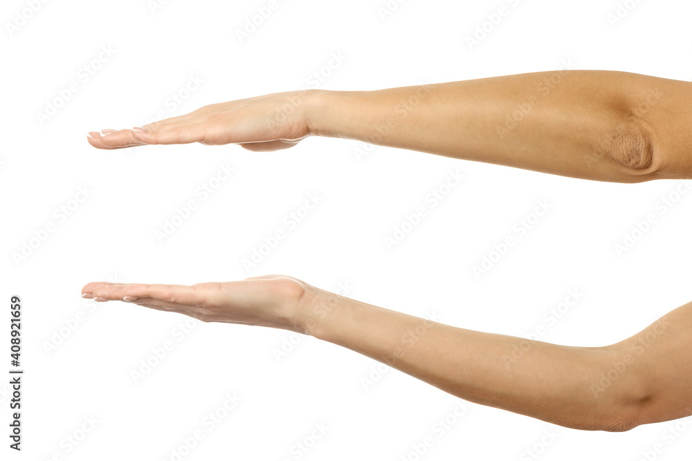 Holding or measuring hands. Woman hand gesturing isolated on white Holding or measuring hands. Woman hand gesturing isolated on white