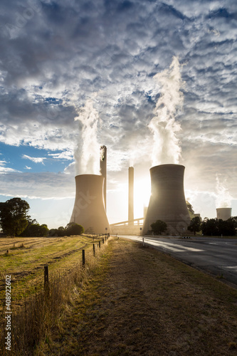 Smokestacks and cooling towers of coal fired power plants. © IzzetNoyan