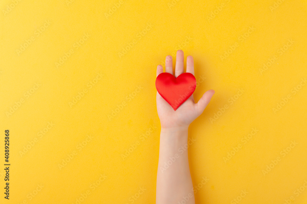 Girl holds in hands red hearts, children arms, love and valentines day concept - obrazy, fototapety, plakaty 