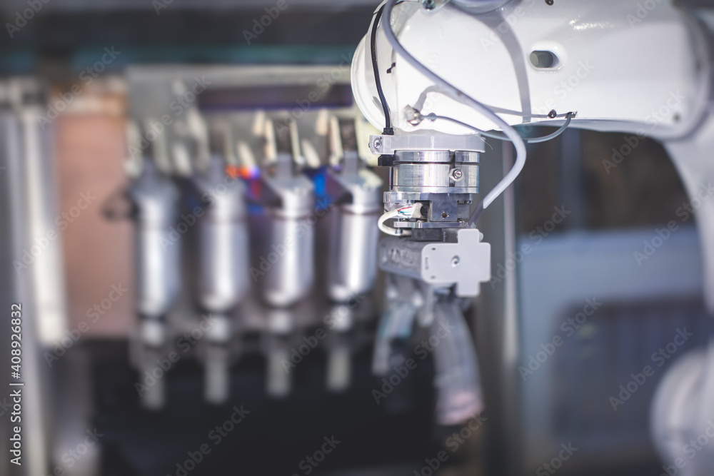 Hydraulic mechanical cyborg robot arm in hand shake gesture, robotized manipulator on a manufacture line Hydraulic mechanical cyborg robot arm in hand shake gesture, robotized manipulator on a manufacture line