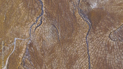 Cracked dry earth from drought aerial photo