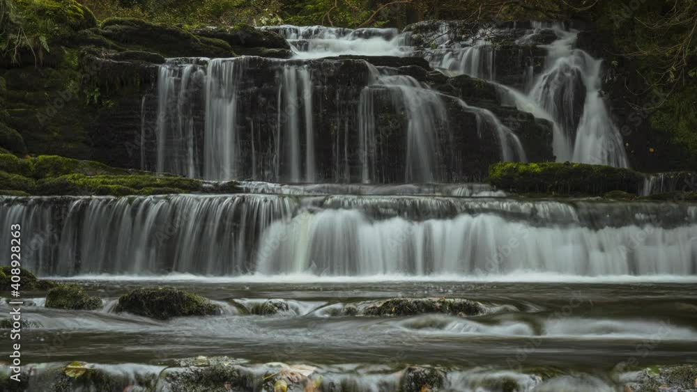 Time lapse of forest waterfall in rural landscape during autumn in Ireland. Time lapse of forest waterfall in rural landscape during autumn in Ireland.