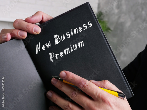  Financial concept about New Business Premium with sign on the sheet.