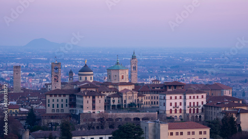 Bergamo. One of the beautiful city in Italy. Landscape at the old town from the hill during sunset. Amazing view of the towers, bell towers and main churches. Touristic destination. Best of Italy