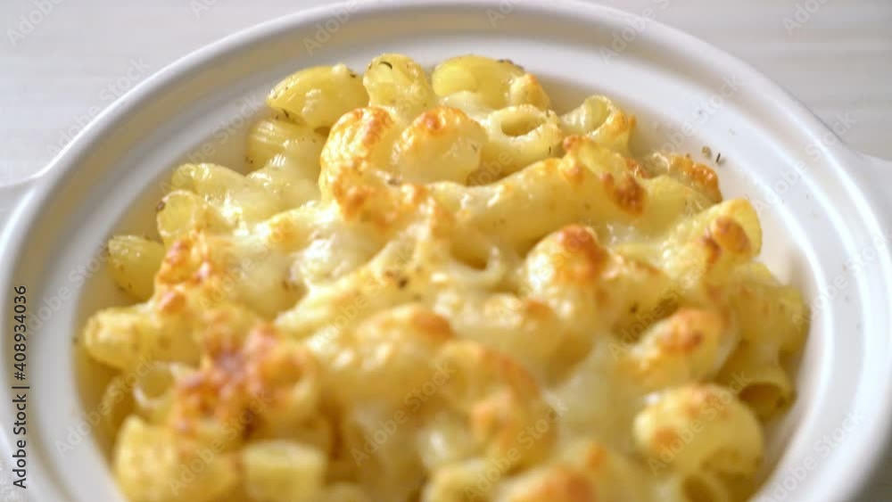 mac and cheese, macaroni pasta in cheesy sauce - American style mac and cheese, macaroni pasta in cheesy sauce - American style