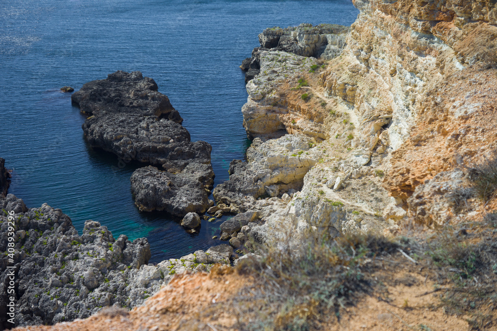 steep descent to the sea