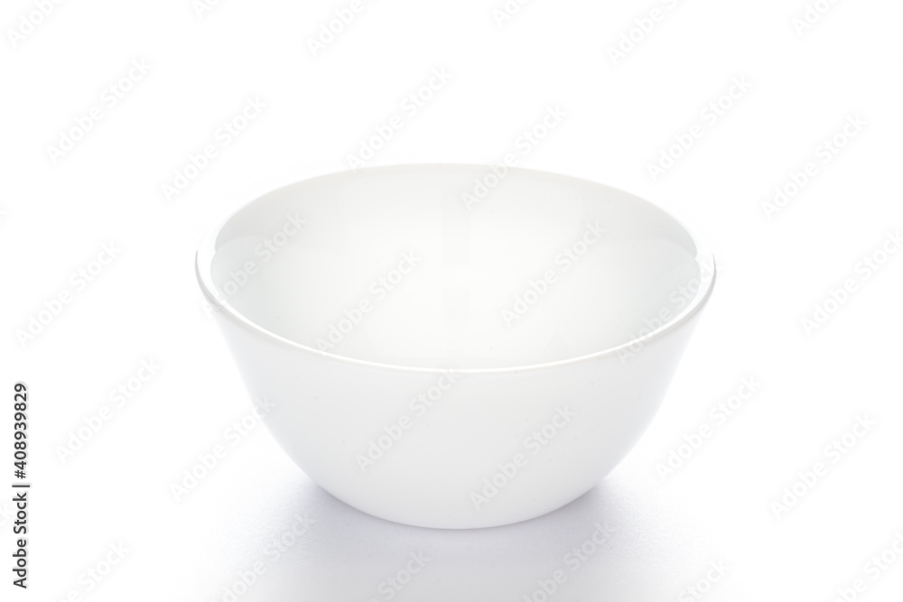 Close up of an empty white ceramic bowl. High key, side view against the white background. Mockup ready. Close up of an empty white ceramic bowl. High key, side view against the white background. Mockup ready.